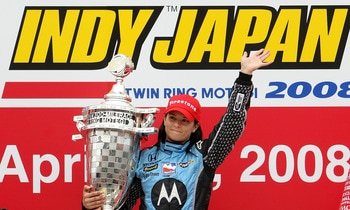 MOTEGI, JAPAN - APRIL 20:  Danica Patrick driver of the #7 Motorola Andretti Green Racing Honda Dallara poses with the trophy after winning the IndyCar Series Bridgestone Indy Japan 300 Mile on April 20, 2008 at Twin Ring Motegi in Motegi, Japan.  (Photo