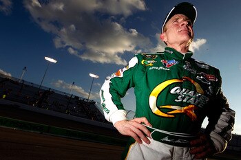 RICHMOND, VA - SEPTEMBER 09:  Mark Martin, driver of the #5 Quaker State/GoDaddy.com Chevrolet, looks on during qualifying for the Sprint Cup Series Wonderful Pistachios 400 at Richmond International Raceway on September 9, 2011 in Richmond, Virginia.  (P
