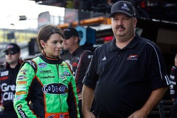 RICHMOND, VA - SEPTEMBER 09:  (L-R) Danica Patrick, driver of the #7 GoDaddy.com/GetYour.NET Chevrolet, stands with crew chief Tony Eury Jr. in the garage area during practice for the Nationwide Series Virginia 529 College Savings 250 at Richmond Internat
