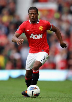 MANCHESTER, ENGLAND - AUGUST 28:  Patrice Evra of Manchester United with the ball during the Barclays Premier League match between Manchester United and Arsenal at Old Trafford on August 28, 2011 in Manchester, England.  (Photo by Alex Livesey/Getty Image