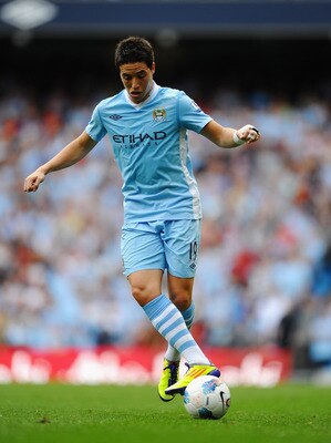 MANCHESTER, ENGLAND - SEPTEMBER 10:  Samir Nasri of Manchester City in action during the Barclays Premier League match between Manchester City and Wigan Athletic at Etihad Stadium on September 10, 2011 in Manchester, England.  (Photo by Laurence Griffiths