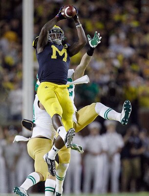 ANN ARBOR, MI - SEPTEMBER 10: Junior Hemingway #21 of the Michigan Wolverines catches a fourth quarter pass while playing the Notre Dame Fighting Irish at Michigan Stadium on September 10, 2010 in Ann Arbor, Michigan. Michigan won the game 35-31. (Photo b