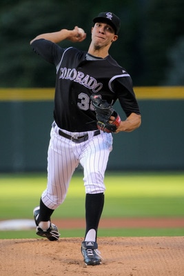 DENVER - SEPTEMBER 26:  Starting pitcher Ubaldo Jimenez #38 of the Colorado Rockies delivers against the St. Louis Cardinals at Coors Field on September 26, 2009 in Denver, Colorado.  (Photo by Doug Pensinger/Getty Images)