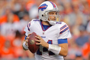 DENVER, CO - AUGUST 20:  Quarterback Ryan Fitzpatrick #14 of the Buffalo Bills drops back to pass against the Denver Broncos during the first half at Sports Authority Field at Mile High on August 20, 2011 in Denver, Colorado. (Photo by Justin Edmonds/Gett