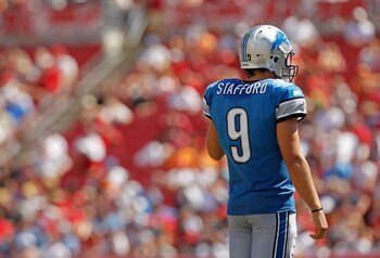 TAMPA, FL - SEPTEMBER 11:  Matthew Stafford #9 of the Detroit Lions waits for a play during the season opener against the Tampa Bay Buccaneers at Raymond James Stadium on September 11, 2011 in Tampa, Florida.  (Photo by Mike Ehrmann/Getty Images)