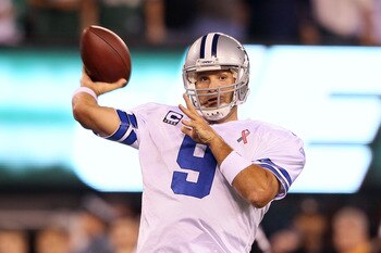 EAST RUTHERFORD, NJ - SEPTEMBER 11:  Tony Romo #9 of the Dallas Cowboys throws a pass against the New York Jets during their NFL Season Opening Game at MetLife Stadium on September 11, 2011 in East Rutherford, New Jersey.  (Photo by Elsa/Getty Images)