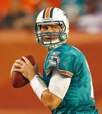 MIAMI GARDENS, FL - AUGUST 19:  Chad Henne #7 of the Miami Dolphins drops back during a preseason NFL game against the Carolina Panthers at Sun Life Stadium on August 19, 2011 in Miami Gardens, Florida.  (Photo by Mike Ehrmann/Getty Images)