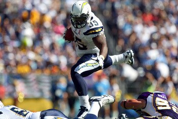 SAN DIEGO, CA - SEPTEMBER 11:   Runningback Mike Tolbert #35 of the San Diego Chargers hurdles over a tackle against the Minnesota Vikings during their season-opening game on September 11, 2011 at Qualcomm Stadium in San DIego, California. (Photo by Donal