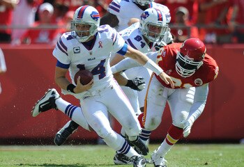 KANSAS CITY, MO - SEPTEMBER 11:  Quarterback Ryan Fitzpatrick #14 of the Buffalo Bills scrambles for yardage against the Kansas City Chiefs during the first quarter on September 11, 2011 at Arrowhead Stadium in Kansas City, Missouri.  (Photo by Peter Aike