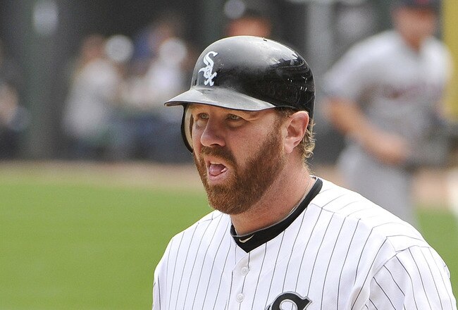 CHICAGO, IL - SEPTEMBER 10:  Adam Dunn #32 of the Chicago White Sox walks back to the dugout after striking out during the first inning against the Cleveland Indians at U.S. Cellular Field on September 10, 2011 in Chicago, Illinois.  (Photo by Brian Kerse