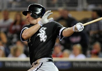 MINNEAPOLIS, MN - SEPTEMBER 5: Brent Morel #22 of the Chicago White Sox hits a two-run single against the Minnesota Twins in the seventh inning of game two of a doubleheader on September 5, 2011 at Target Field in Minneapolis, Minnesota. The White Sox def