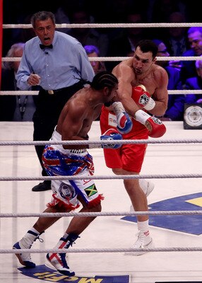 HAMBURG, GERMANY - JULY 02:  Wladimir Klitschko of the Ukraine attemps a right hook to David Haye of England during their heavy weight unification match at the Imtech Arena on July 2, 2011 in Hamburg, Germany.  (Photo by Scott Heavey/Getty Images)