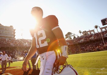 STANFORD, CA - SEPTEMBER 03:  Andrew Luck #12 of the Stanford Cardinal walks off the field after their game against the San Jose State Spartans at Stanford Stadium on September 3, 2011 in Stanford, California.  (Photo by Ezra Shaw/Getty Images)