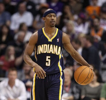 PHOENIX - DECEMBER 03:  T.J. Ford #5 of the Indiana Pacers handles the ball during the NBA game against the Phoenix Suns at US Airways Center on December 3, 2010 in Phoenix, Arizona.  The Suns defeated the Pacers 105-97.  NOTE TO USER: User expressly ackn