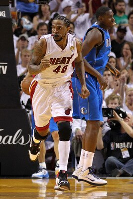 MIAMI, FL - JUNE 12:  Udonis Haslem #40 of the Miami Heat reacts against the Dallas Mavericks in Game Six of the 2011 NBA Finals at American Airlines Arena on June 12, 2011 in Miami, Florida. NOTE TO USER: User expressly acknowledges and agrees that, by d