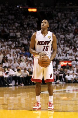 MIAMI, FL - JUNE 12:  Mario Chalmers #15 of the Miami Heat gets set to shoot a free throw attempt against the Dallas Mavericks in Game Six of the 2011 NBA Finals at American Airlines Arena on June 12, 2011 in Miami, Florida. NOTE TO USER: User expressly a