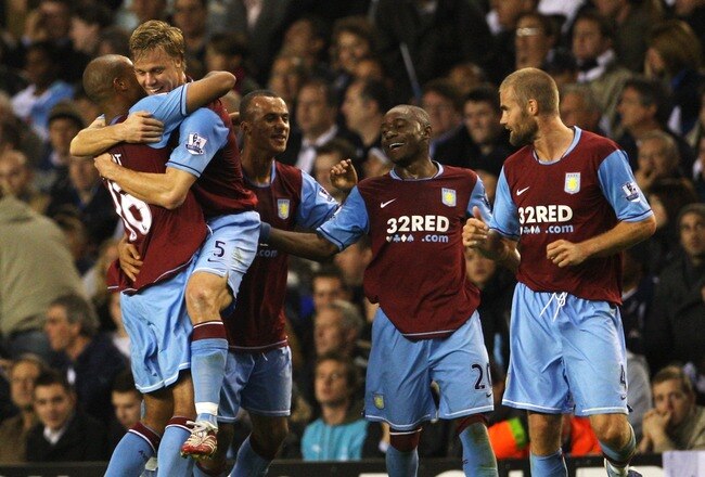 LONDON - OCTOBER 01:  Zat Knight and Martin Laursen of Villa celebrate his and Villa's second goal during the Barclays Premier League match between Tottenham Hotspur and Aston Villa at White Hart Lane on October 1, 2007 in London, England.  (Photo by Phil