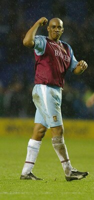 LEICESTER, ENGLAND - JANUARY 31:  Dion Dublin of Aston Villa celebrates his goal during the FA Barclaycard Premiership match between Leicester City and Aston Villa at the Walkers Stadium on January 31, 2004 in Leicester, England.  (Photo by Mark Thompson/