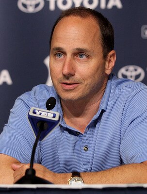 NEW YORK, NY - JULY 08:  General manager Brian Cashman of the New York Yankees speaks to the media after the game against the Tampa Bay Rays was postponed due to rain on July 8, 2011 at Yankee Stadium in the Bronx borough of New York City.  (Photo by Jim