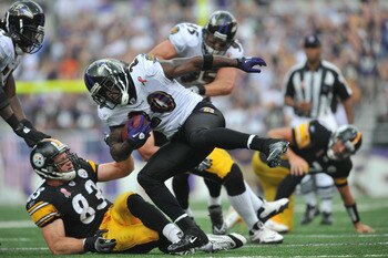 BALTIMORE, MD - SEPTEMBER 11:  Ed Reed #20 of the Baltimore Ravens runs back an interception against the Pittsburgh Steelers at M&T Bank Stadium on September 11, 2011 in Baltimore, Maryland. The Ravens defeated the Steelers 35-7. (Photo by Larry French/Ge