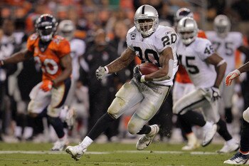 DENVER, CO - SEPTEMBER 12:  Darren McFadden #20 of the Oakland Raiders rushes for 47 yards to set up a fourth quarter touchdown against the Denver Broncos at Sports Authority Field at Mile High on September 12, 2011 in Denver, Colorado. The Raiders defeat