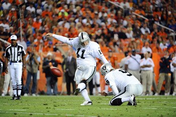 DENVER, CO - SEPTEMBER 12: Sebastian Janikowski #11 of the Oakland Raiders kicks a field goal against the Denver Broncos at Sports Authority Field at Mile High on September 12, 2011 in Denver, Colorado.  (Photo by Garrett W. Ellwood/Getty Images)