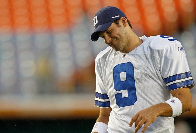 MIAMI GARDENS, FL - SEPTEMBER 01:  Tony Romo #9 of the Dallas Cowboys warms up during a Pre-Season NFL game against the Miami Dolphins at Sun Life Stadium on September 1, 2011 in Miami Gardens, Florida.  (Photo by Mike Ehrmann/Getty Images)