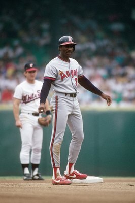 1990: Devon White #30 of the California Angels stands on second base against the Chicago White Sox in the 1990 season. (Photo by: Jonathan Daniel/Getty Images)