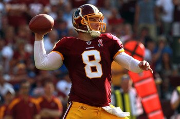 LANDOVER, MD - SEPTEMBER 11:  Quarterback  Rex Grossman #8 of the Washington Redskins throws the ball in the second quarter against the New York Giants at FedExField on September 11, 2011 in Landover, Maryland.  (Photo by Ronald Martinez/Getty Images)