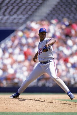 SAN DIEGO - MAY 2:  Dwight Gooden #16 of the New York Mets winds up for a pitch during a game against the San Diego Padres at Jack Murphy Stadium on May 2, 1993 in San Diego, California.  (Photo by Stephen Dunn/Getty Images)