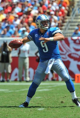 TAMPA, FL - SEPTEMBER 11:  Quarterback Matthew Stafford #9 of the Detroit Lions sets to pass against the Tampa Bay Buccaneers at Raymond James Stadium September 11, 2011 in Tampa, Florida. (Photo by Al Messerschmidt/Getty Images)