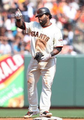 SAN FRANCISCO, CA - SEPTEMBER 11: Pablo Sandoval #48 of the San Francisco Giants points to the sky after hitting a double during a game against the Los Angeles Dodgers at AT&T Park on September 11, 2011 in San Francisco, California.  (Photo by Tony Medina