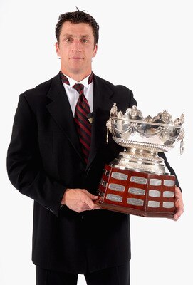 TORONTO, ON - JUNE 14:  Rod Brind'Amour of the Carolina Hurricanes poses for a portrait backstage with the Frank J. Selke Trophy for Top Defensive Forward in the NHL during the 2007 NHL Awards at the Elgin Theatre on June 14, 2007 in Toronto, Ontario.  (P