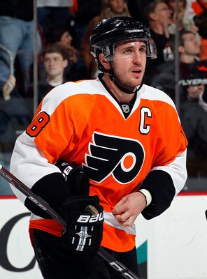 PHILADELPHIA, PA - MARCH 22:  Mike Richards #18 of the Philadelphia Flyers skates during a timeout in an NHL hockey game against the Washington Capitals at the Wells Fargo Center on March 22, 2011 in Philadelphia, Pennsylvania.  (Photo by Paul Bereswill/G