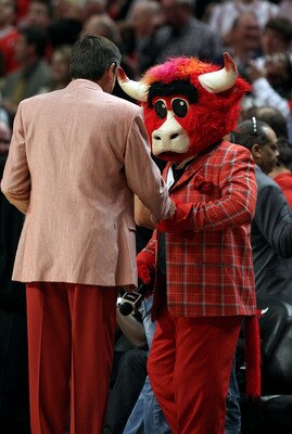 CHICAGO, IL - MAY 18:  Benny the Bull, mascot for the Chicago Bulls jokes around with TNT sideline reporter Craig Sager against the Miami Heat in Game Two of the Eastern Conference Finals during the 2011 NBA Playoffs on May 18, 2011 at the United Center i