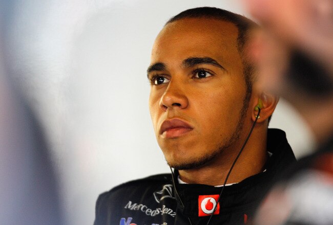 MONZA, ITALY - SEPTEMBER 10:  Lewis Hamilton of Great Britain and McLaren prepares to drive during qualifying for the Italian Formula One Grand Prix at the Autodromo Nazionale di Monza on September 10, 2011 in Monza, Italy.  (Photo by Paul Gilham/Getty Im