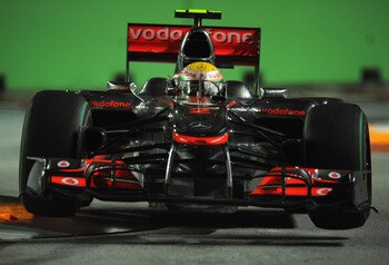 Hamilton at the 2010 Singapore Grand Prix. Note the wheels off the ground!