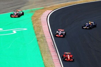 Lewis runs wide on lap one
