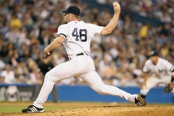 NEW YORK - JUNE 12: Kyle Farnsworth #48 of the New York Yankees delivers the pitch against the Arizona Diamondbacks during their game on June 12, 2007 at Yankee Stadium in the Bronx borough of New York City. (Photo by Al Bello/Getty Images)