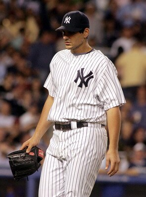 NEW YORK - JUNE 17:  Carl Pavano #45 of the New York Yankees walks off the mound after getting pulled from the game against the Chicago Cubs in the sixth inning on June 17, 2005 at Yankee Stadium in the Bronx borough of New York City.  (Photo by Jim McIsa