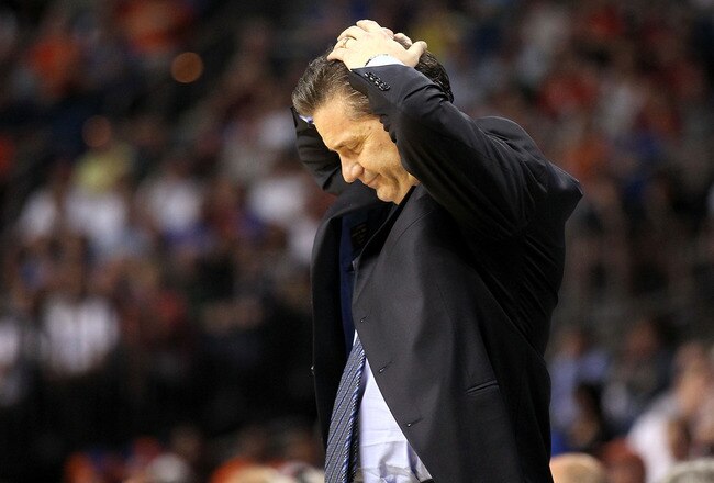 TAMPA, FL - MARCH 19:  Head coach John Calipari of the Kentucky Wildcats reacts against the West Virginia Mountaineers during the third round of the 2011 NCAA men's basketball tournament at St. Pete Times Forum on March 19, 2011 in Tampa, Florida.  (Photo