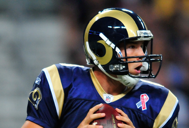 ST. LOUIS, MO - SEPTEMBER 11: Sam Bradford #8 of the St. Louis Rams drops back to pass against the Philadelphia Eagles at the Edward Jones Dome on September 11, 2011 in St. Louis, Missouri. The Eagles defeated the Rams 31-15. (Photo by Jeff Curry/Getty Im