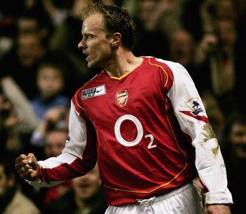 LONDON - FEBRUARY 1: Dennis Bergkamp of Arsenal punches the air in delight after scoring the teams second goal of the game, during the Barclays Premiership match between Arsenal and Manchester United at Highbury on February 1, 2005 in London, England.  (P