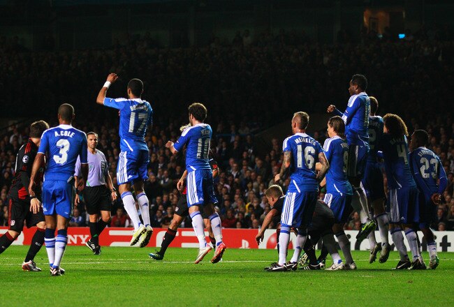 LONDON, ENGLAND - SEPTEMBER 13:  Michael Ballack of Bayer Leverkusen takes a free kick during the UEFA Champions League group E match between Chelsea FC and Bayer 04 Leverkusen at Stamford Bridge on September 13, 2011 in London, England.  (Photo by Paul G
