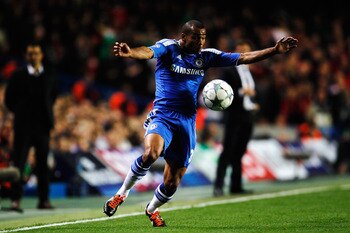 LONDON, ENGLAND - SEPTEMBER 13:  Ashley Cole of Chelsea controls the ball during the UEFA Champions League group E match between Chelsea FC and Bayer 04 Leverkusen at Stamford Bridge on September 13, 2011 in London, England.  (Photo by Paul Gilham/Getty I