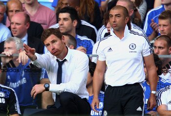 LONDON, ENGLAND - AUGUST 20:  (L-R) Andre Villas-Boas the Chelsea manager and his assistant coach Roberto di Matteo look on during the Barclays Premier League match between Chelsea and West Bromwich Albion at Stamford Bridge on August 20, 2011 in London,