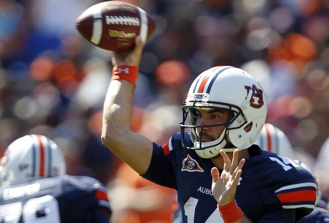 AUBURN, AL - SEPTEMBER 10:  Quarterback Barrett Trotter #14 of the Auburn Tigers throws a screen pass against the Mississippi State Bulldogs in the third quarter on September 10, 2011 at Jordan-Hare Stadium in Auburn, Alabama. (Photo by Butch Dill/Getty I