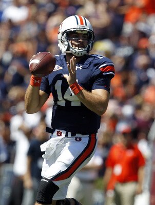 AUBURN, AL - SEPTEMBER 10:  Quarterback Barrett Trotter #14 looks for a receiver against the Mississippi State Bulldogs in the first half on September 10, 2011 at Jordan-Hare Stadium in Auburn, Alabama. (Photo by Butch Dill/Getty Images)