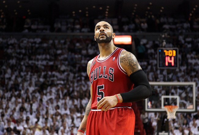 MIAMI, FL - MAY 24:  Carlos Boozer #5 of the Chicago Bulls looks on against the Miami Heat in Game Four of the Eastern Conference Finals during the 2011 NBA Playoffs on May 24, 2011 at American Airlines Arena in Miami, Florida. The Heat won 101-93 in over