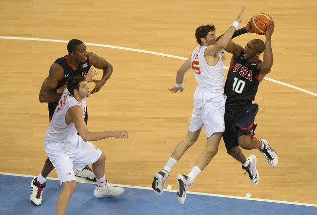 BEIJING - AUGUST 24:  Kobe Bryant #10 of the United States goes up for a shot over Rudy Fernandez #5 of Spain in the gold medal game during Day 16 of the Beijing 2008 Olympic Games at the Beijing Olympic Basketball Gymnasium on August 24, 2008 in Beijing,